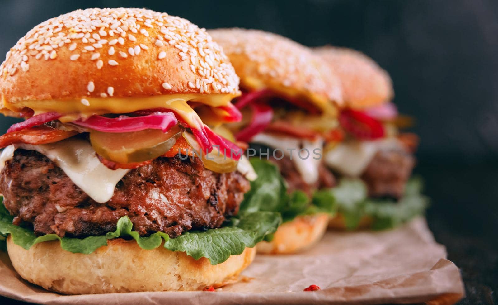 a delicious and juicy burger home in a rustic style with a big chop of beef