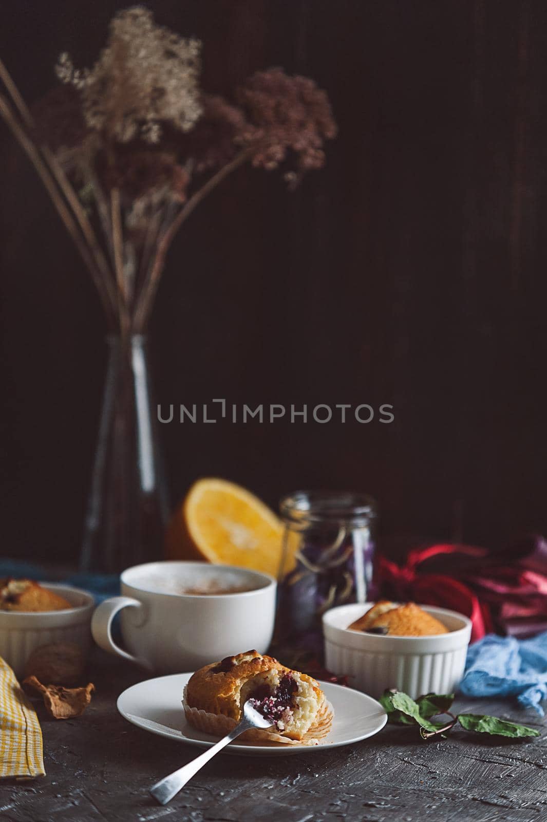 spring breakfast with muffins in rustic style