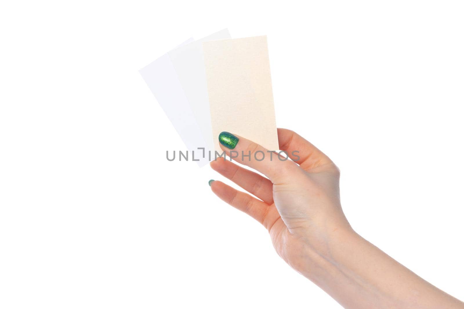 Woman's hand showing white paper banner isolated on white background