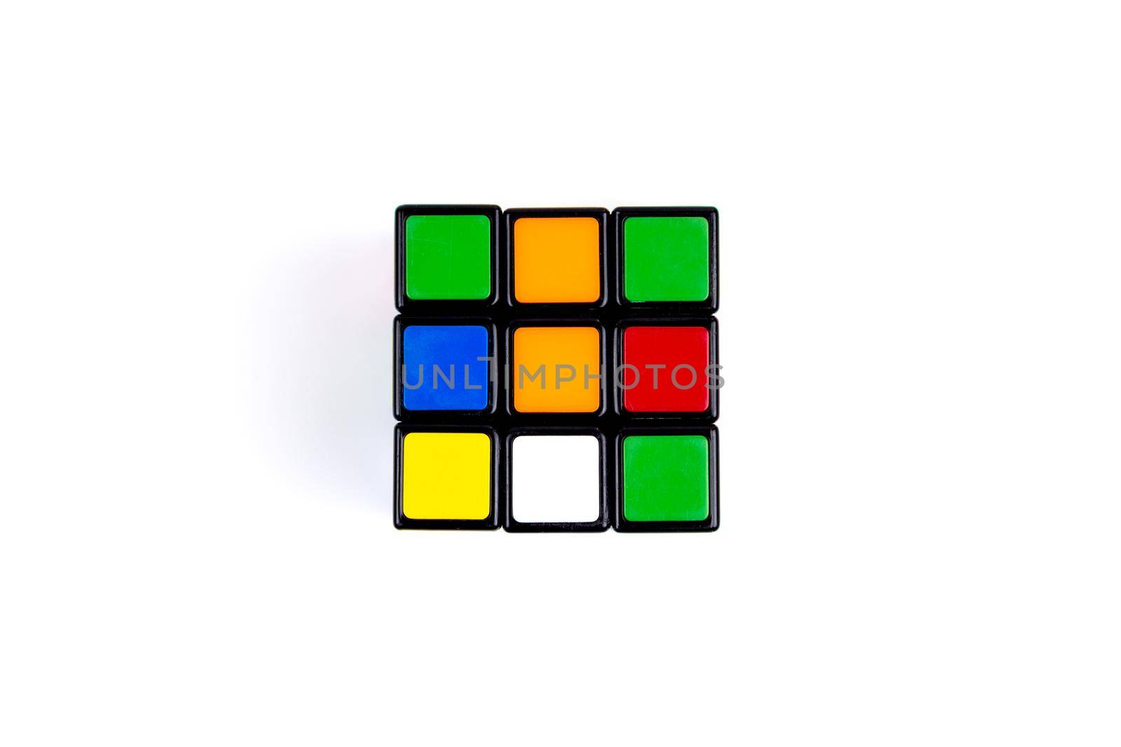 Game multi-colored cube on a white background. Game concept with copy space for text.