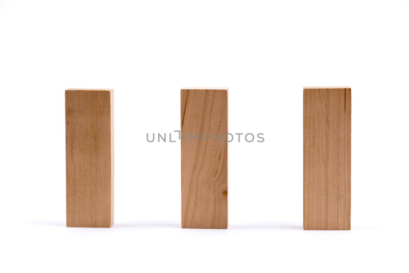 Three Wood Game Blocks with Copy Space Isolated on a White Background