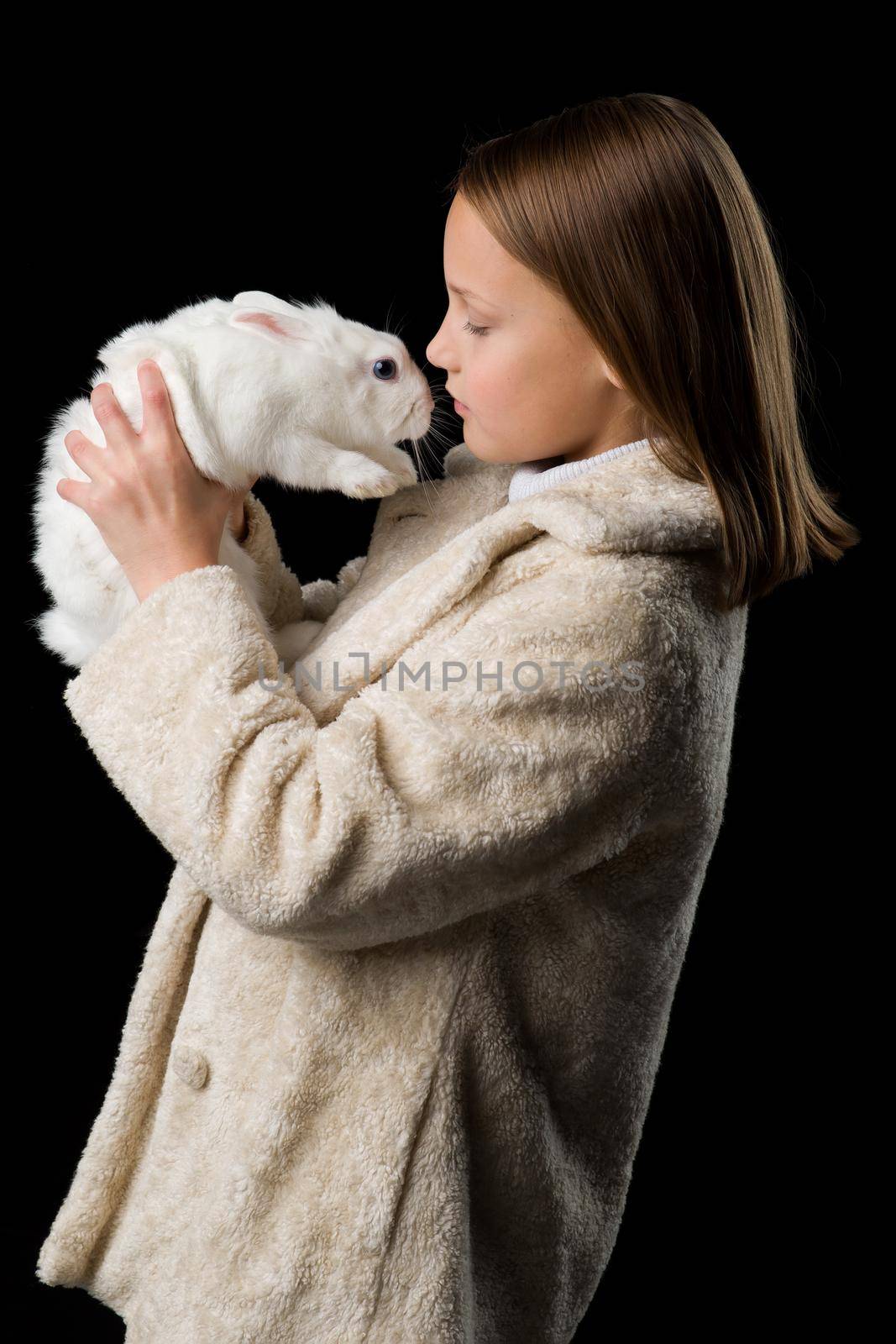 Pretty stylish girl with white rabbit by kolesnikov_studio