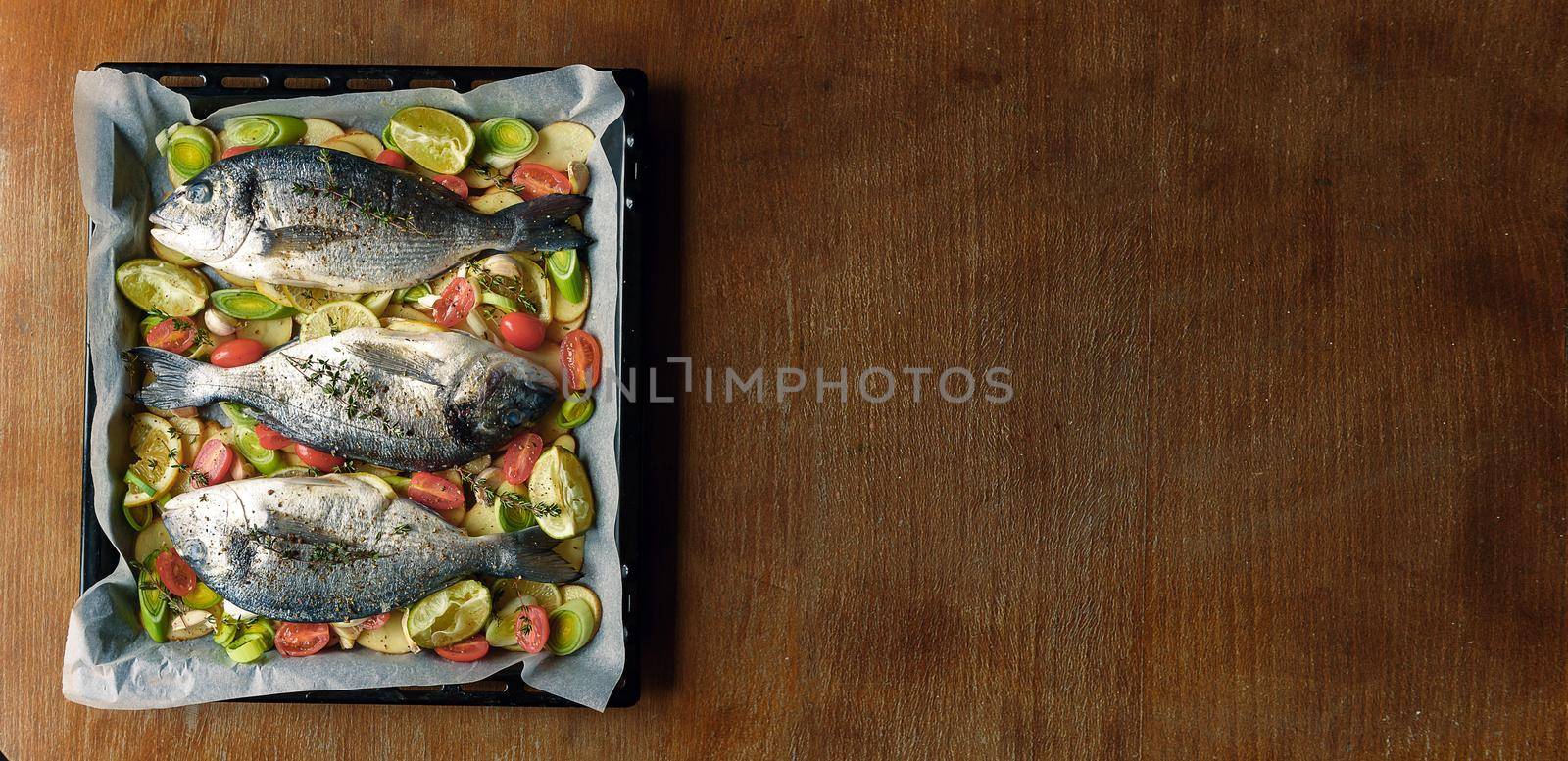fish is prepared for baking in the oven by vvmich