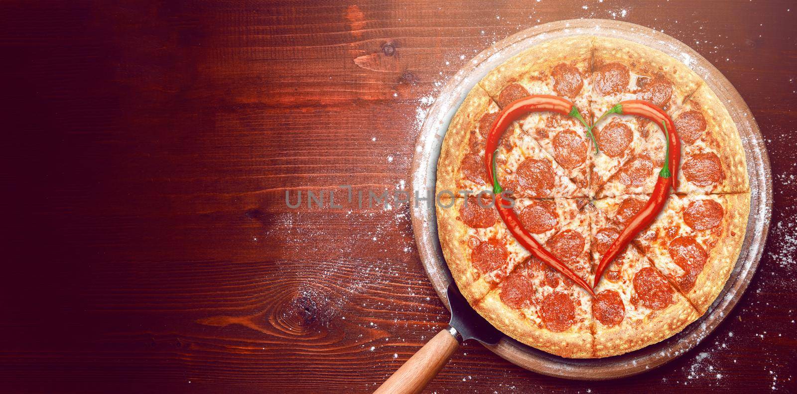 fresh american pizza on wooden table with space for text by vvmich