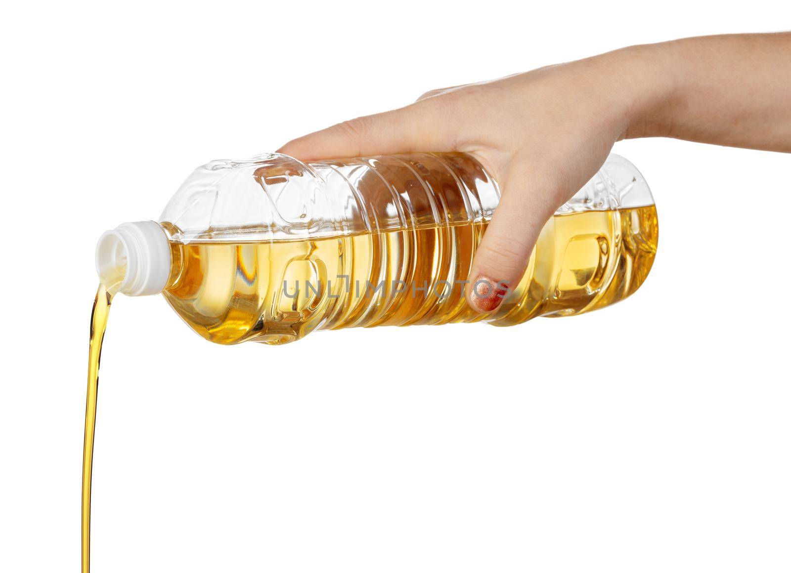 Hand of woman pouring cooking oil from plastic bottle. Isolated on white background. by Fabrikasimf