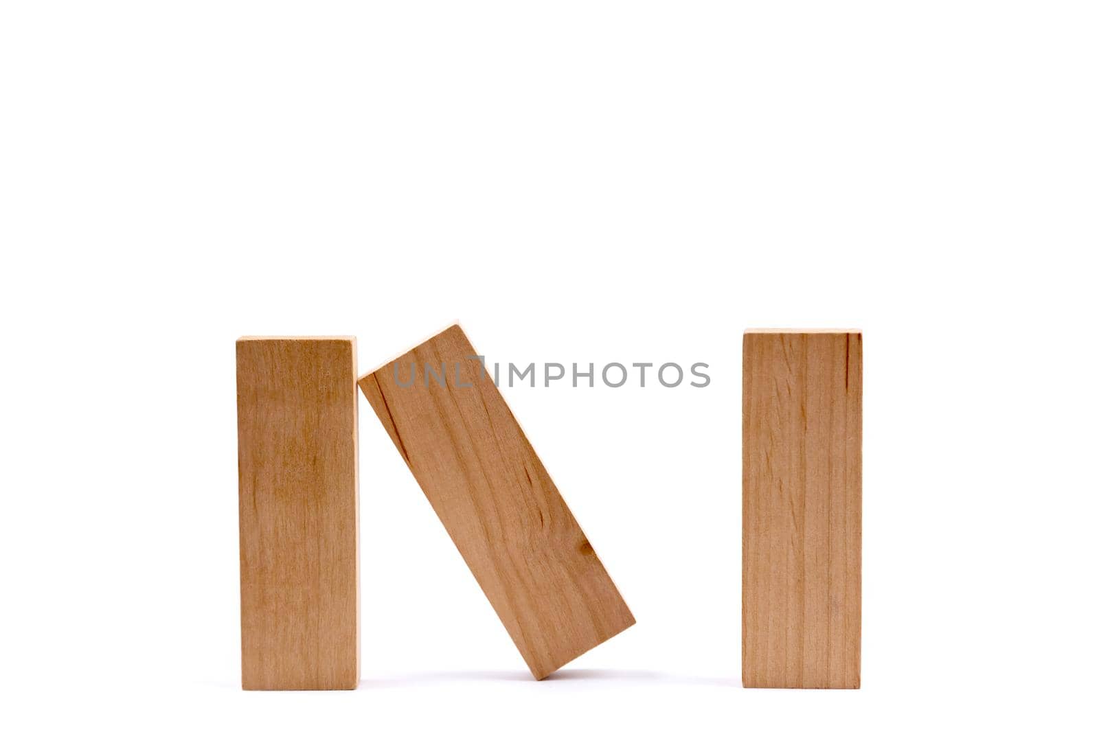 Three Wood Game Blocks with Copy Space Isolated on a White Background. by lunarts