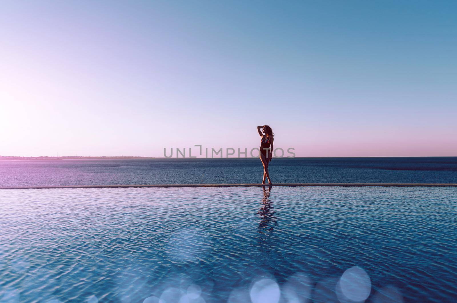 girl by the pool