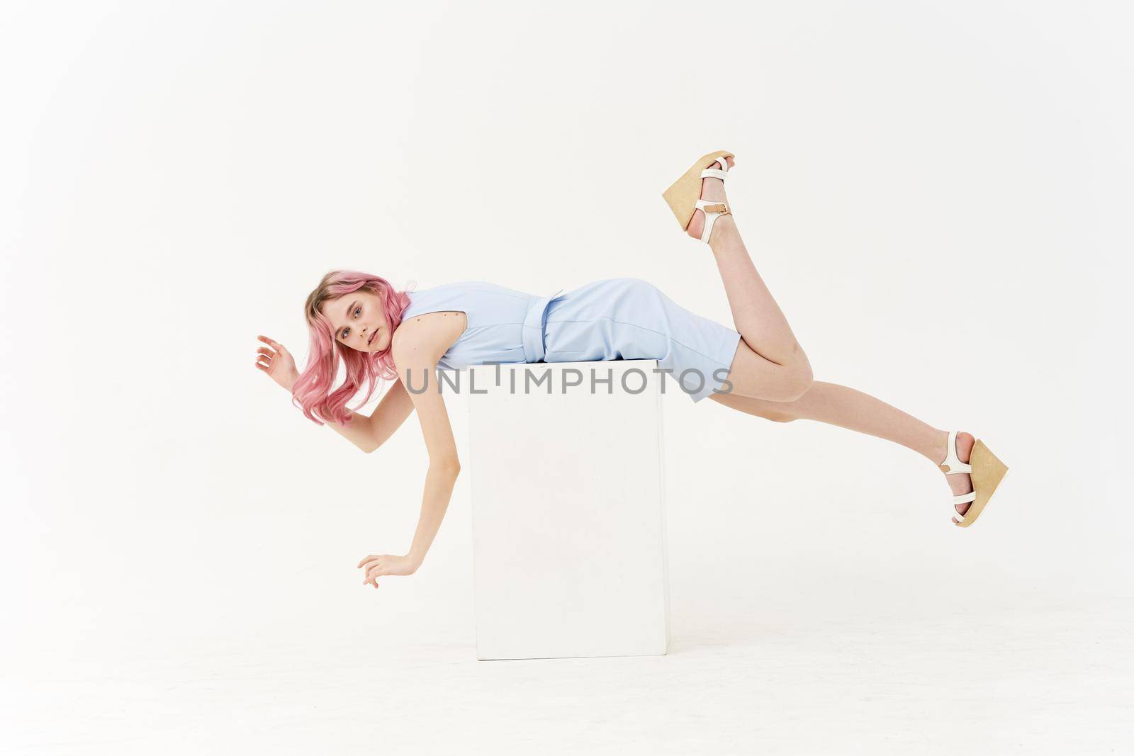 woman in dress pink hair full length posing. High quality photo