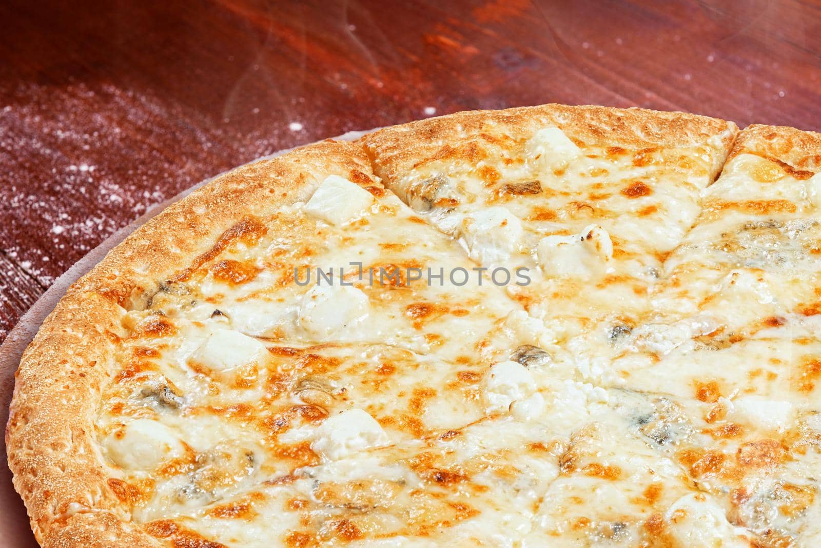 classic Italian pizza on a wooden tray, served in a small authentic Italian restaurant