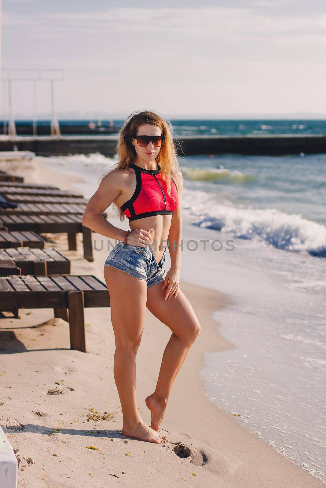 Young healthy lifestyle sport fitness instructor happy woman in bikini on beach. by mmp1206