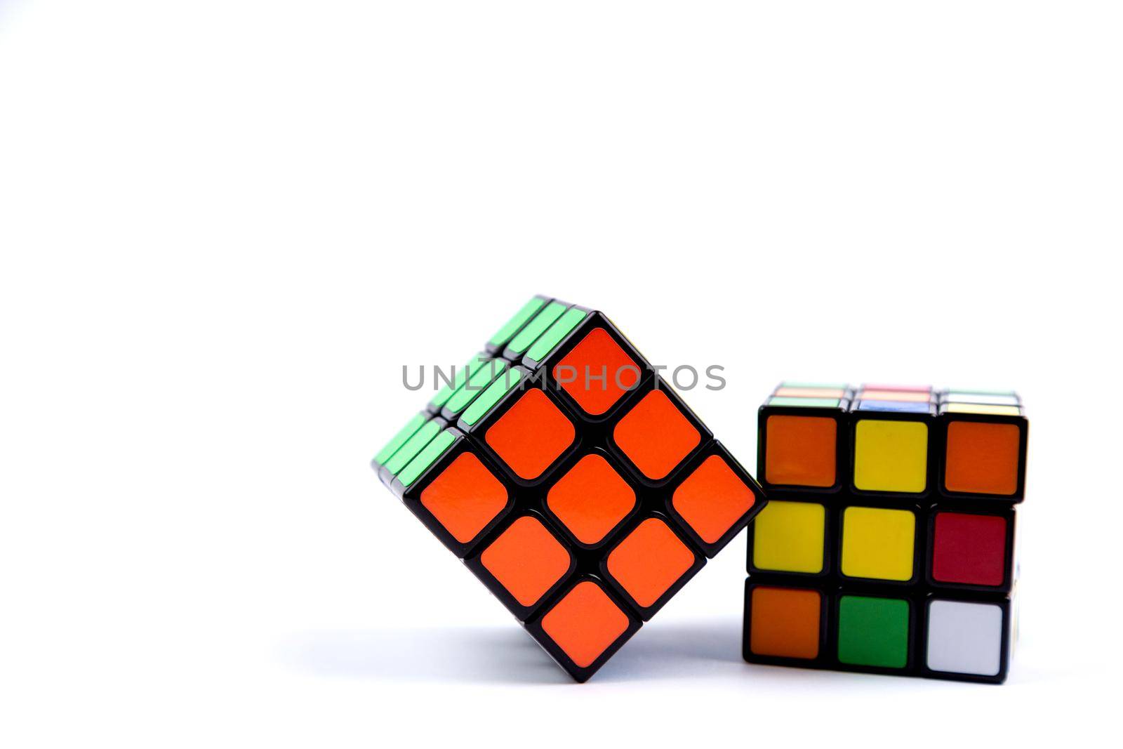 Game multi-colored cube on a white background. Game concept with copy space for text by lunarts