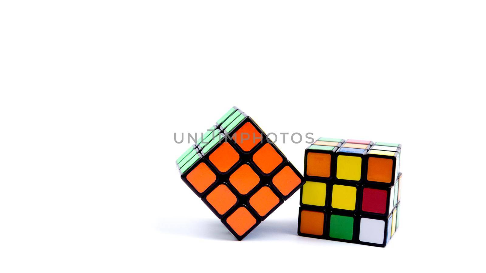 Game multi-colored cube on a white background. Game concept with copy space for text.