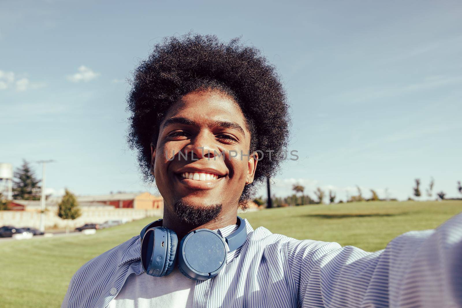 selfie of young afro man with headphones