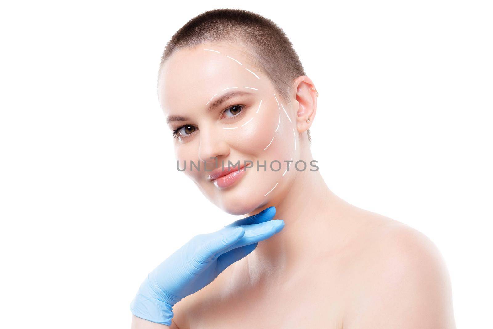 Portrait of attractive woman with arrows on her face skin for cosmetology
