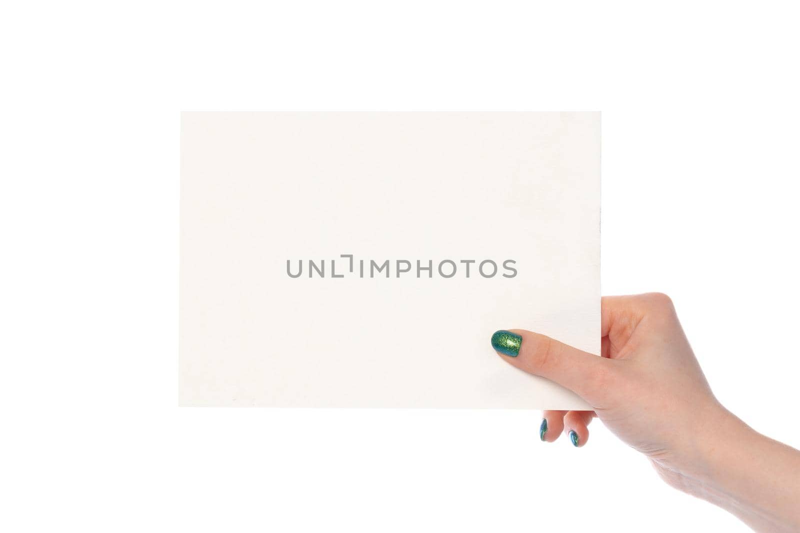 Woman's hand showing white paper banner isolated on white background