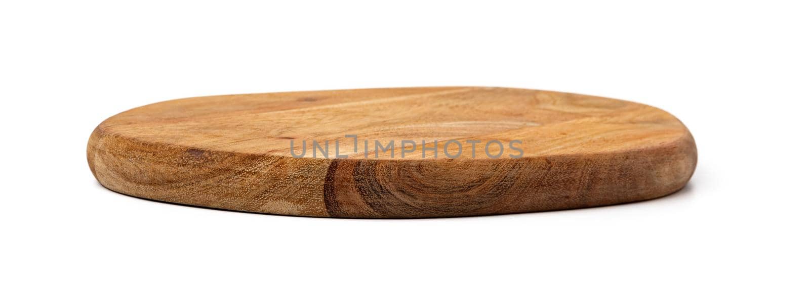 Wooden cutting board on a white background, close up