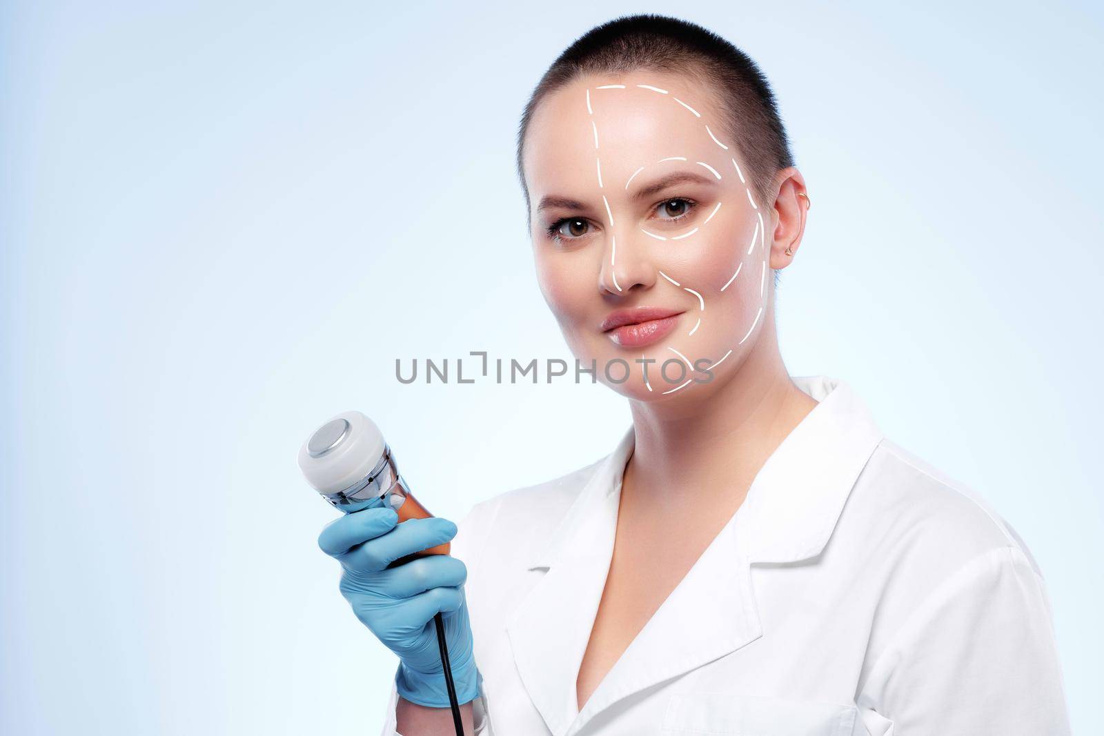 Portrait of attractive woman with arrows on her face skin for cosmetology