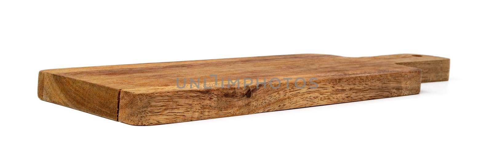 Wooden cutting board on a white background, close up