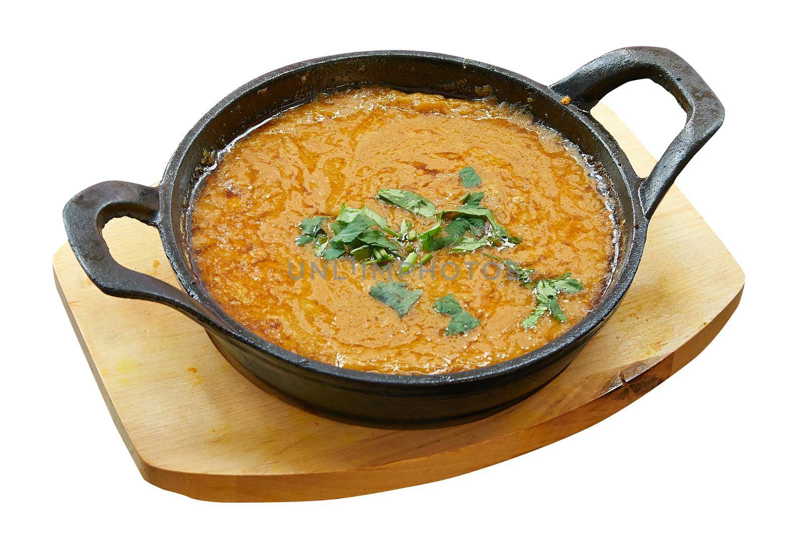 Overhead  shot of Dhal baked in little pan. by pbombaert