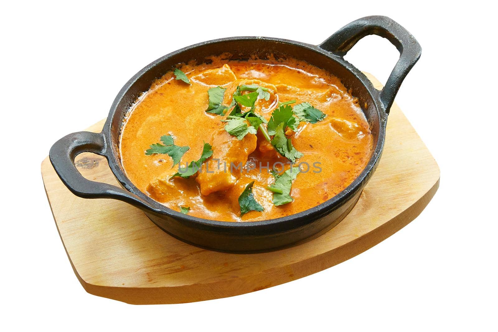 Overhead  shot of Chicken butter baked in little pan. Isolated on white with clipping path