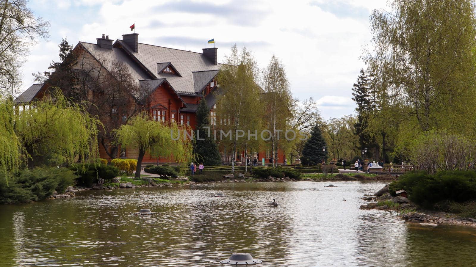 Luxurious residence of the former President of Ukraine Viktor Yanukovych on the shore of the pond. Luxurious house Honka in Mezhyhirya. Ukraine, Novye Petrovtsi - June 05, 2021