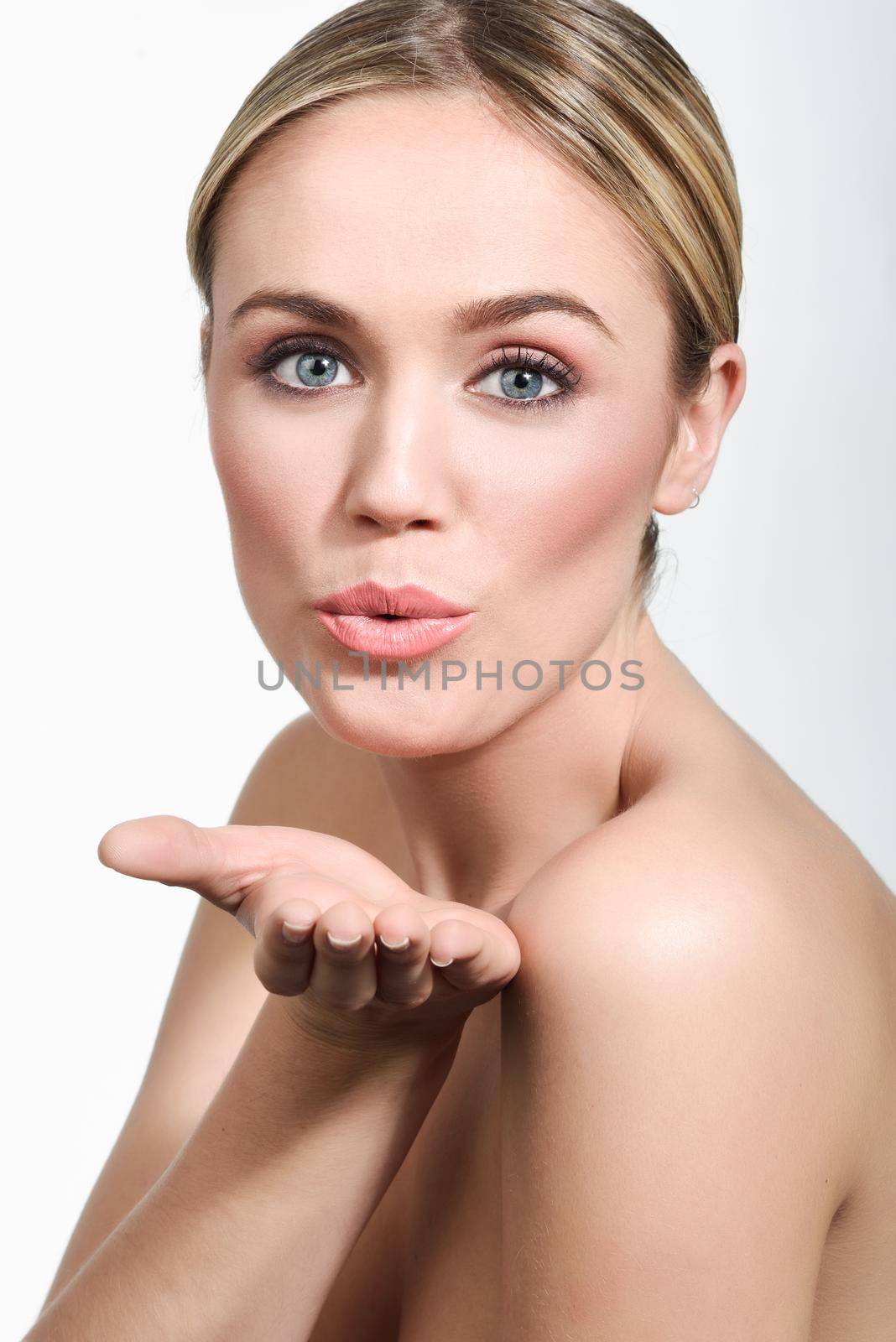 Beautiful blonde woman with clean fresh skin close up by javiindy