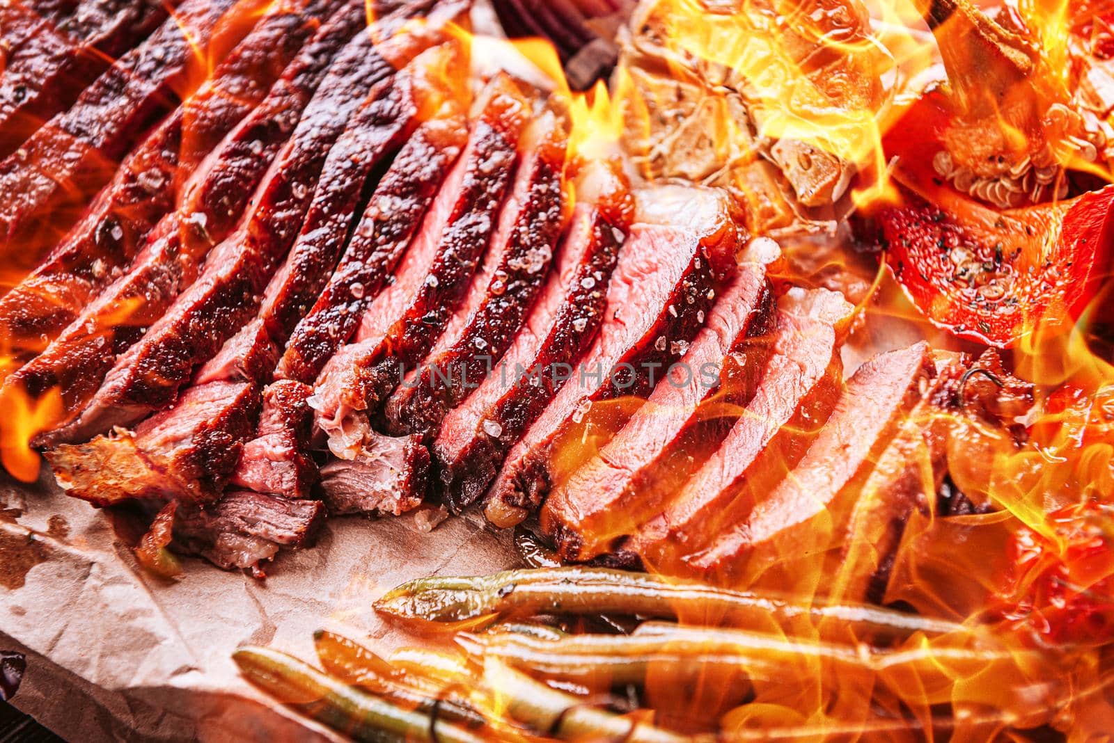 chopped meat with vegetables served like flambe meat