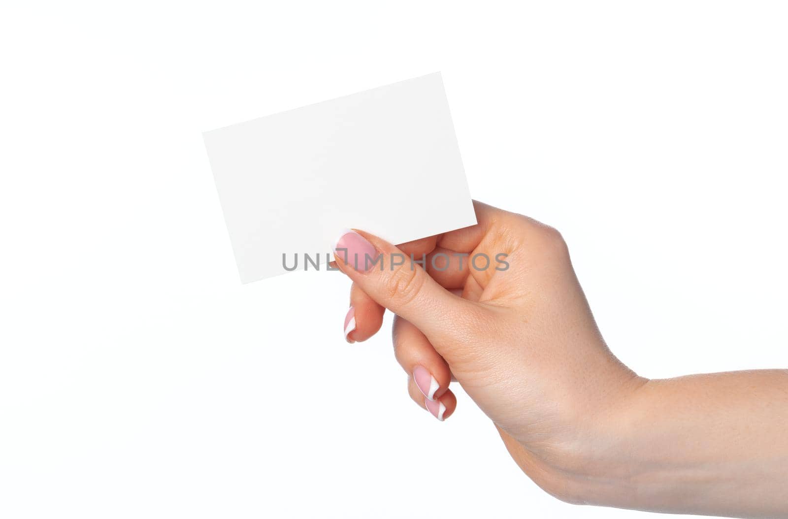 Female hand with blank white business card isolated on white background