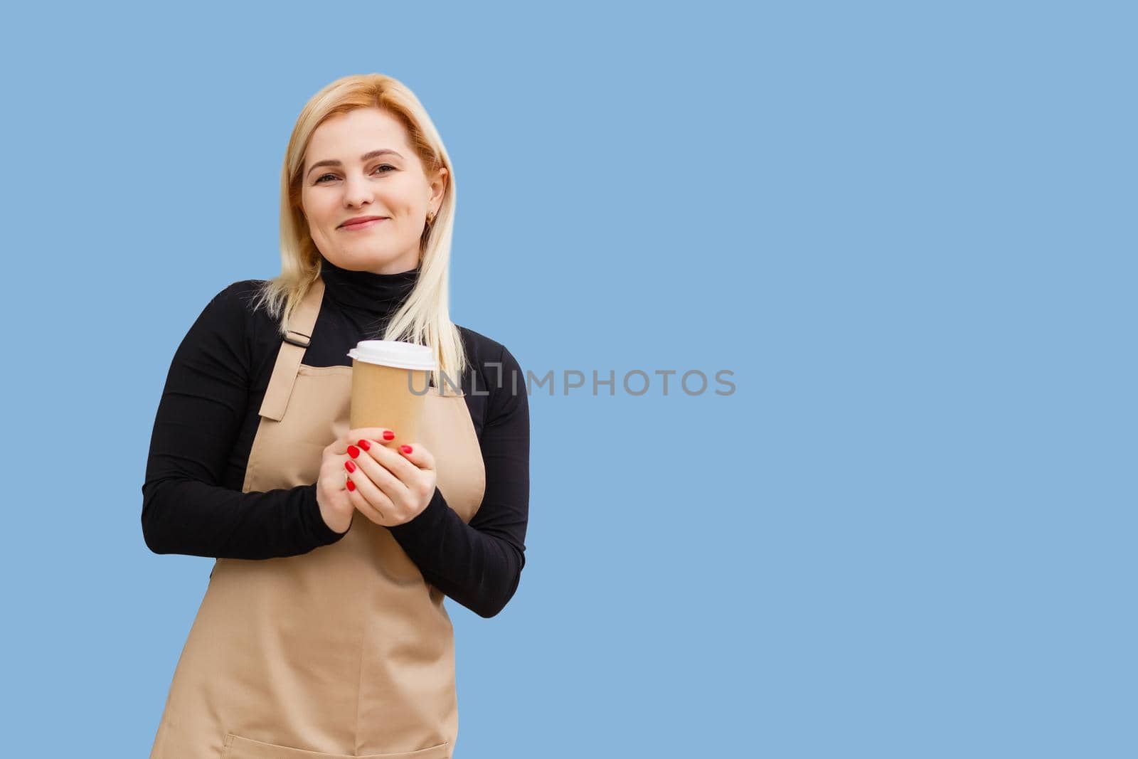 Part-time job person owner cacao routine lifestyle rest break relax leisure pause concept. Portrait of kind friendly pleasant girl giving big latte isolated on blue background copy-space.