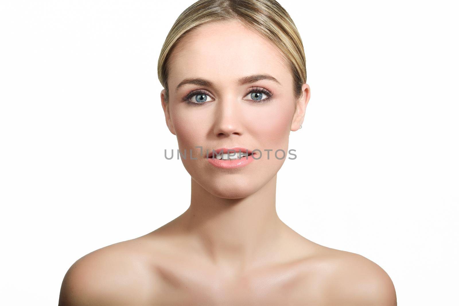 Beautiful woman with clean fresh skin close up. Skin care face. Cosmetology. Blonde girl with blue eyes.