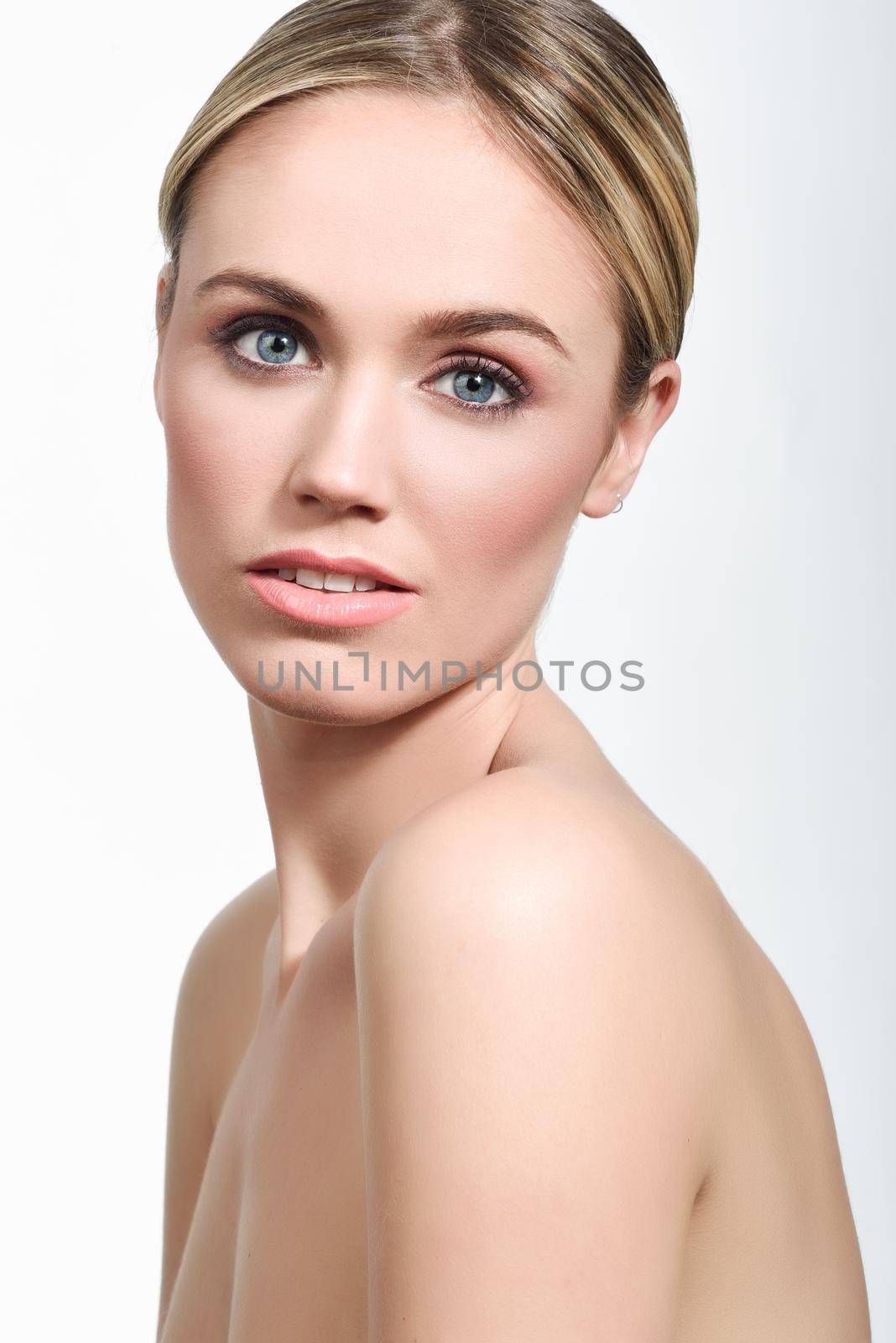 Beautiful woman with clean fresh skin close up. Skin care face. Cosmetology. Blonde girl with blue eyes.