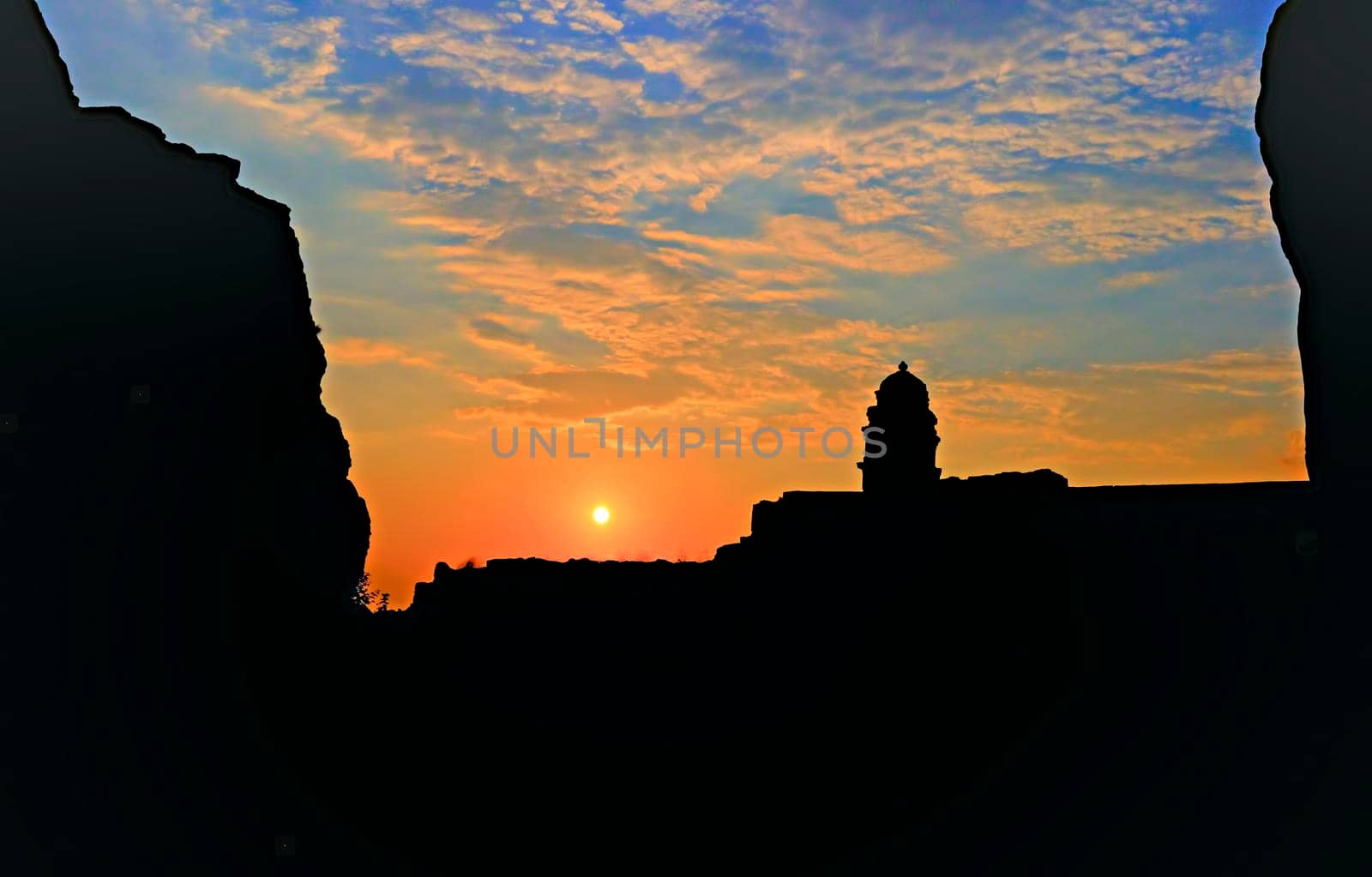 Beautiful Sunset behind Badami fort in Karnataka, India by lalam