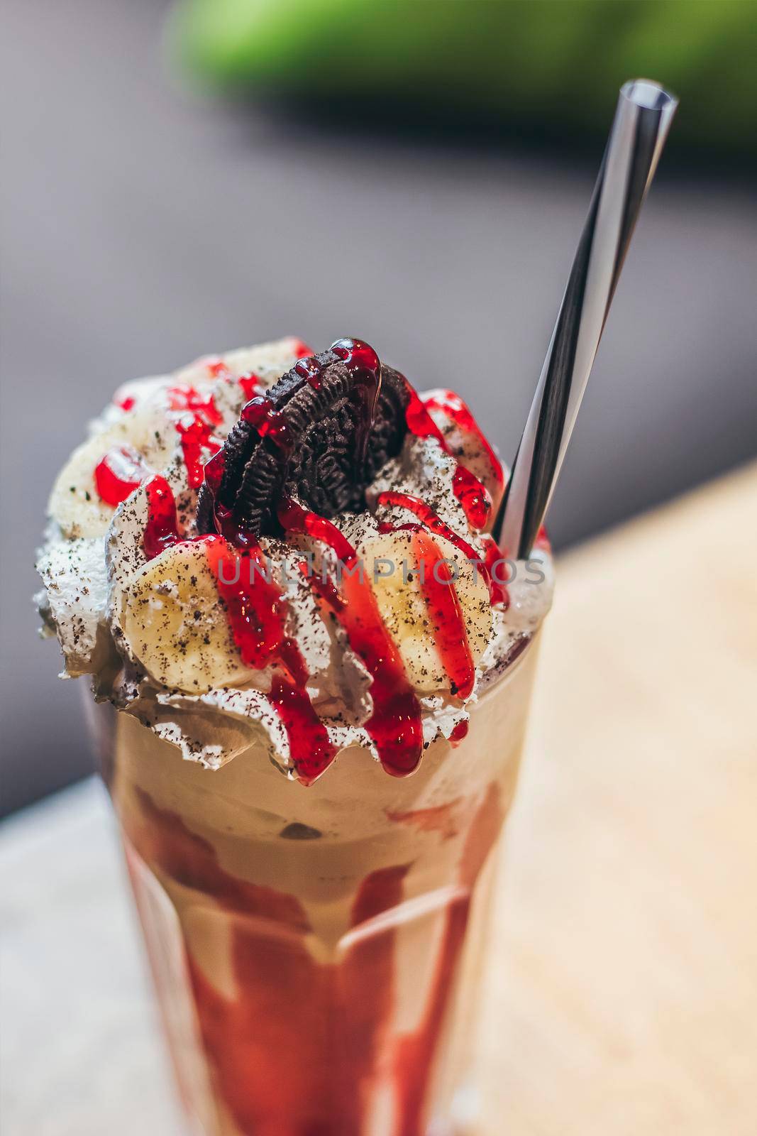 A glass with delicious coffee ice cream red shake.