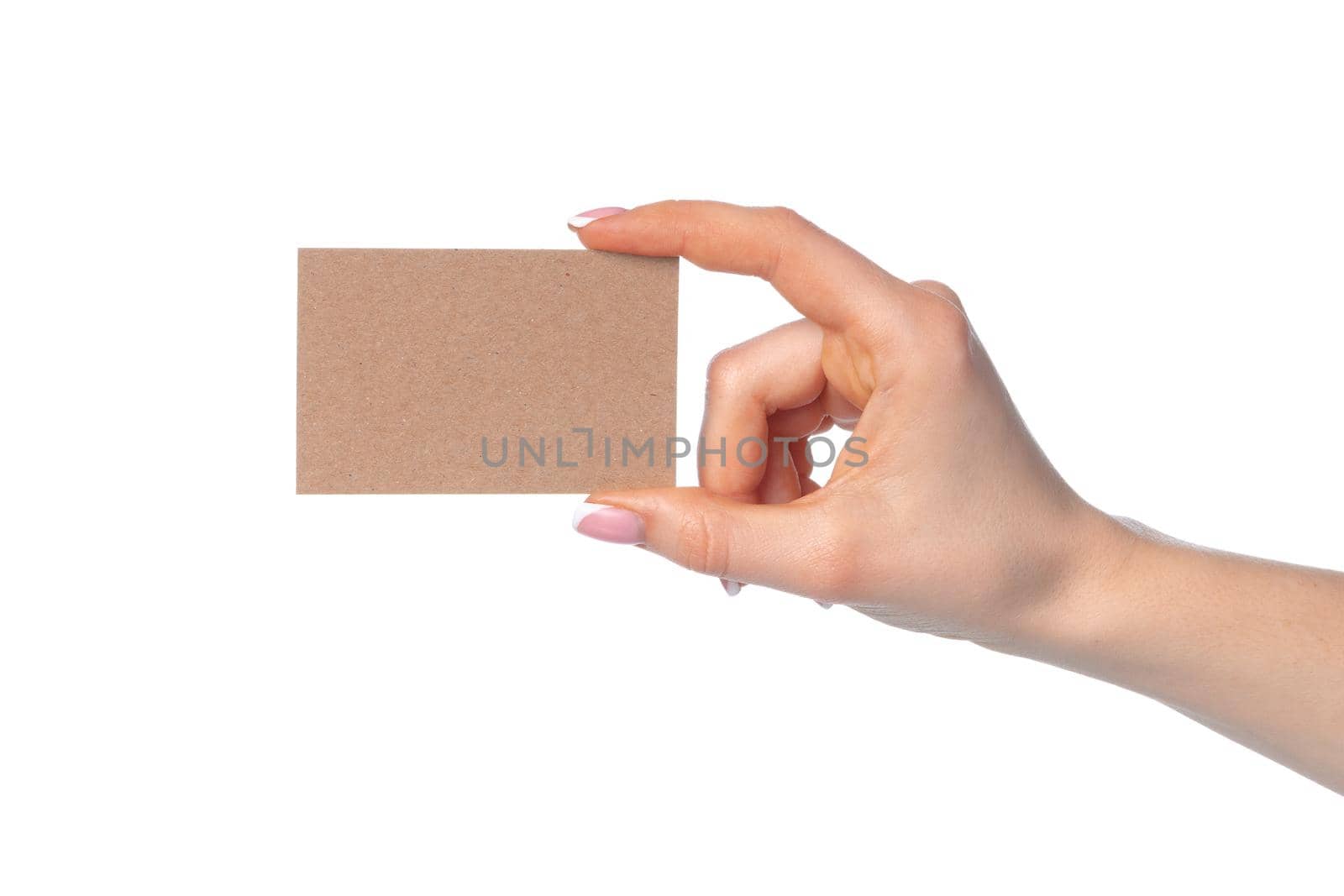 Craft paper card in female hand isolated on white by Fabrikasimf