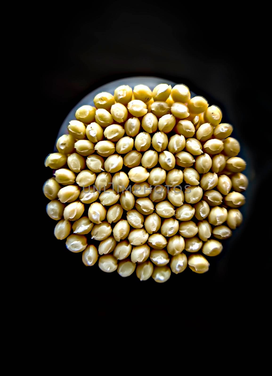 Extreme close up image of toothpick stick tips kept in a jar.