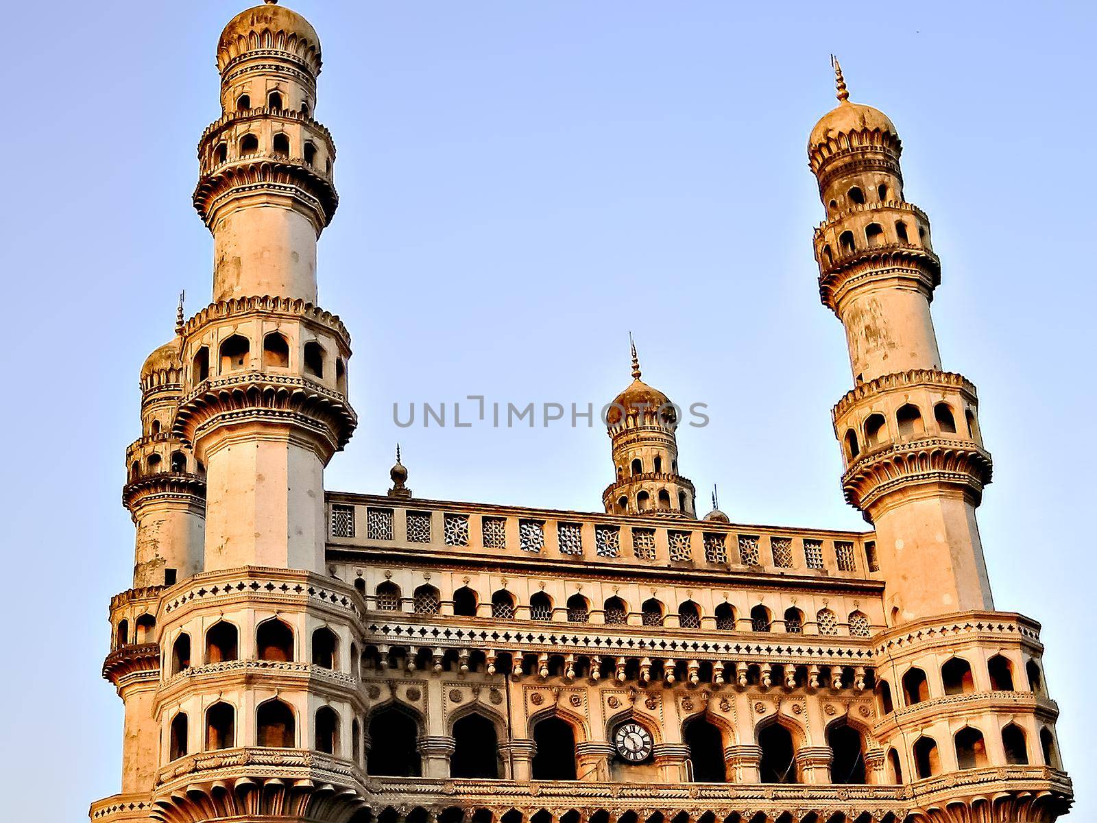 Close up image of Charminar with a clear blue sky background in Hyderabad. by lalam