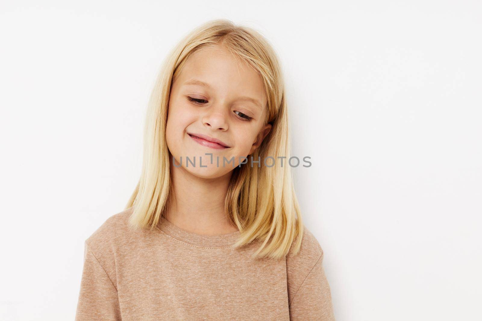 Portrait of a smiling little cutie Fashion textile baby clothes template lifestyle concept by SHOTPRIME