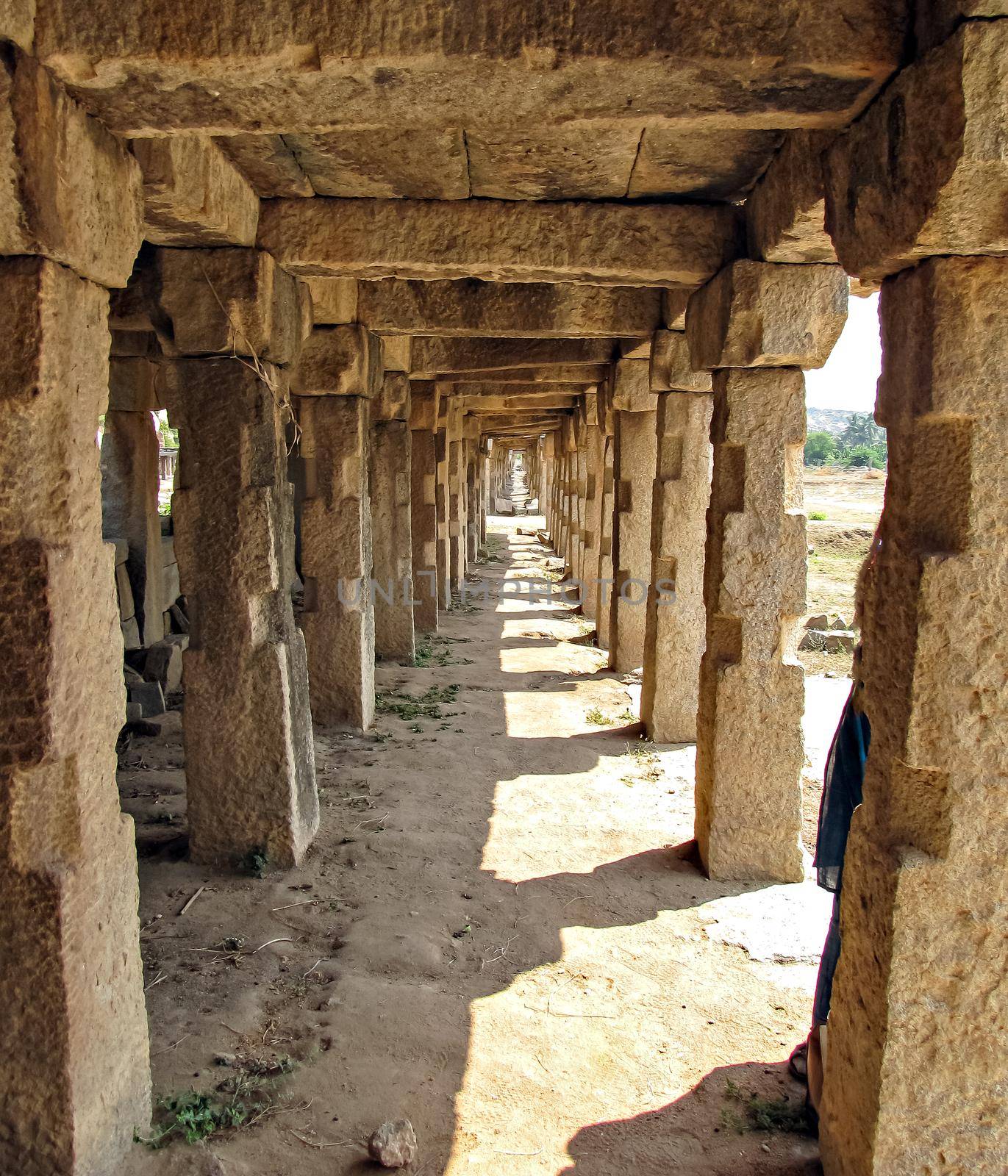 Inside view of ancient stone made Hampi bazaar or market place.