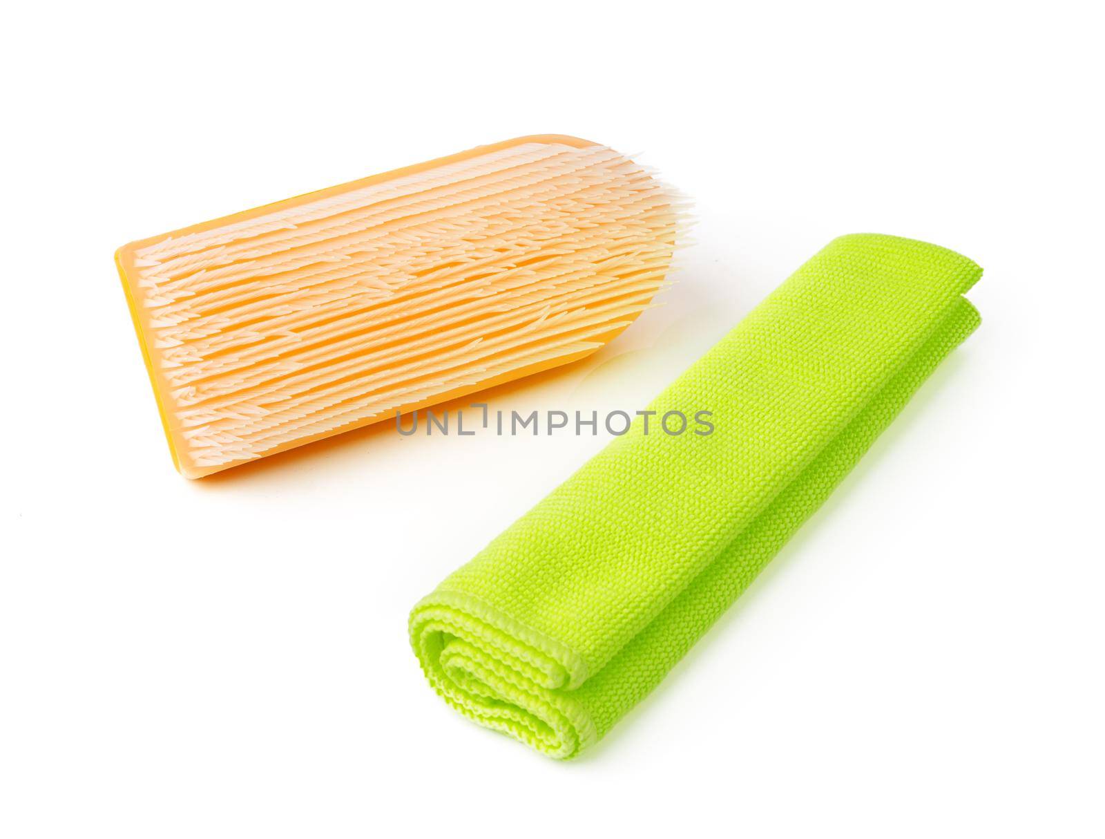 Cleaning brush and cloth isolated on white background, close up