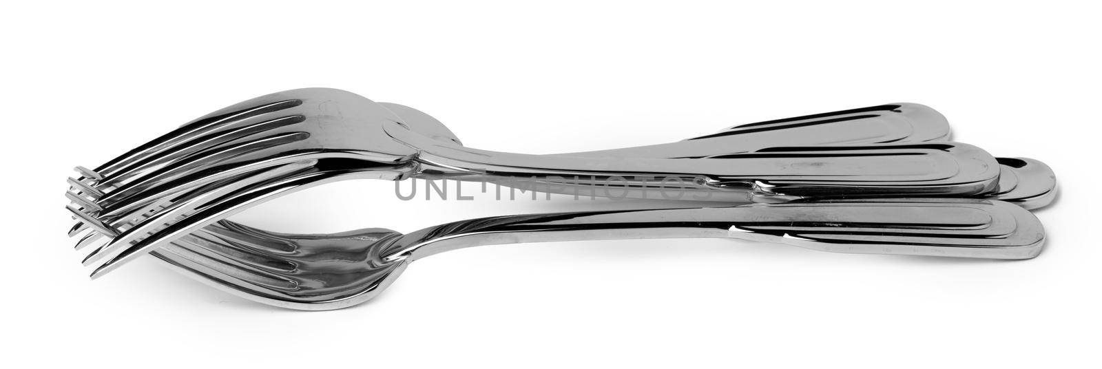 Set of new cutlery isolated on white background close up
