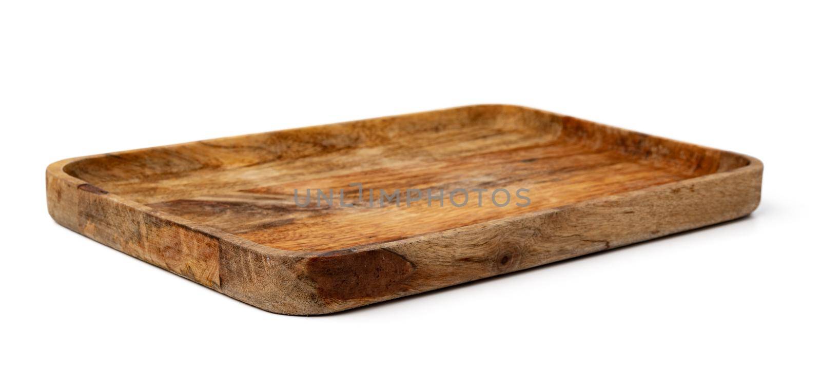 Dark wooden cutting board on white background by Fabrikasimf