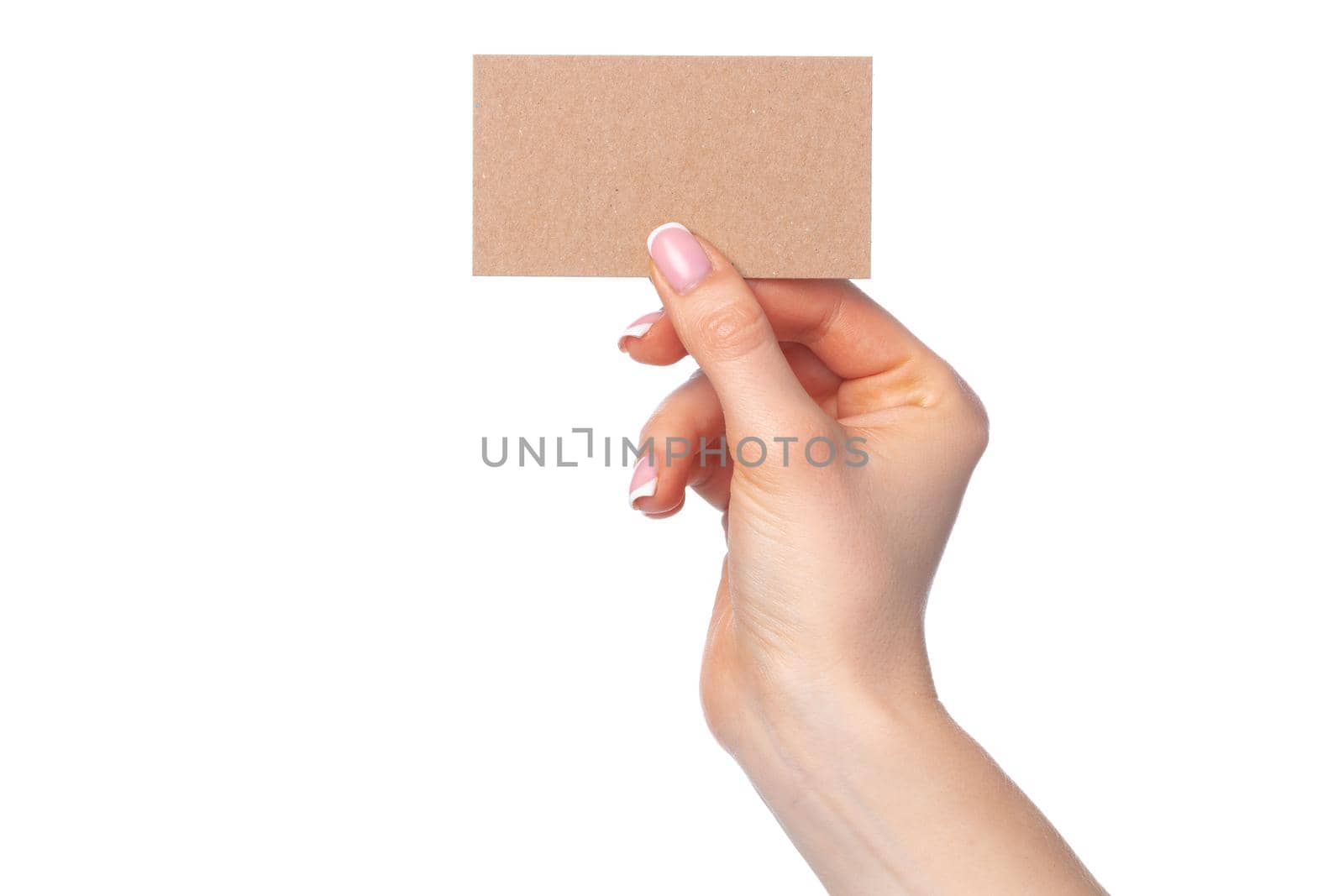 Beautiful female hand holding white business card on white background by Fabrikasimf
