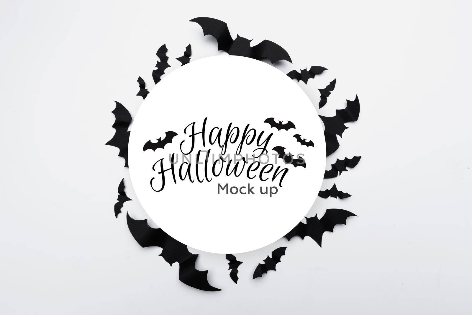 Halloween concept - paper bats on white background by Fabrikasimf
