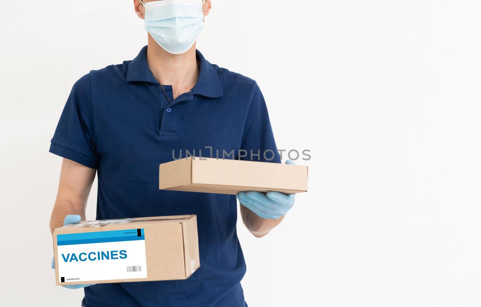 delivery medical box of vaccines from courier man receive package from professional delivery Coronavirus, Covid 19 virus, vaccine.