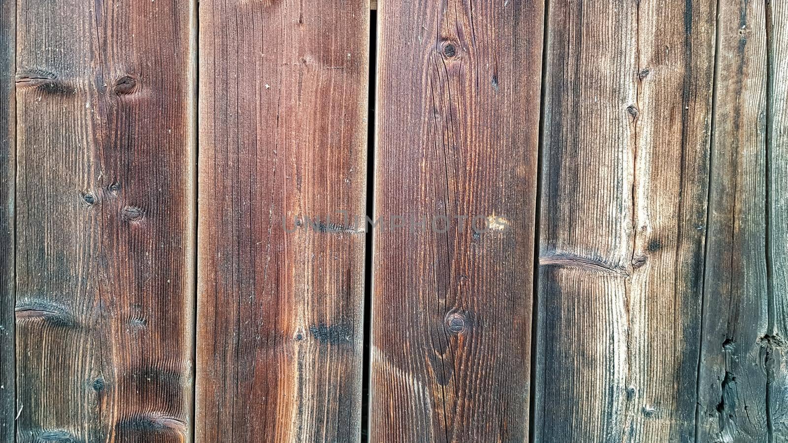wood texture as background. Top view of the surface of the table for shooting flat lay. Abstract blank template. Rustic Weathered Wood Shed with Knots and Nail Holes.