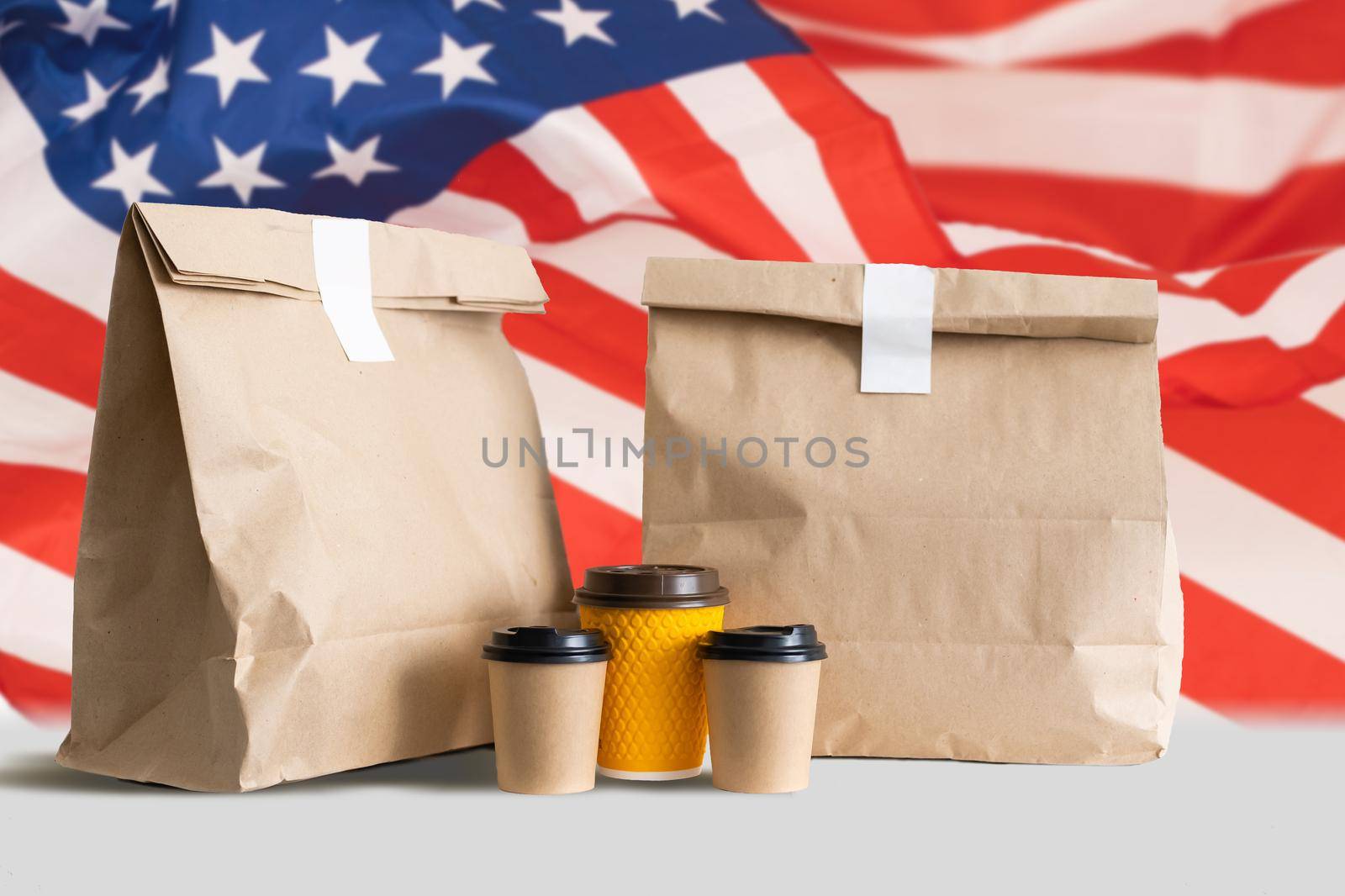 packages on the background of the usa flag. Import Export Shopping online or eCommerce delivery service store product shipping, trade, supplier concept