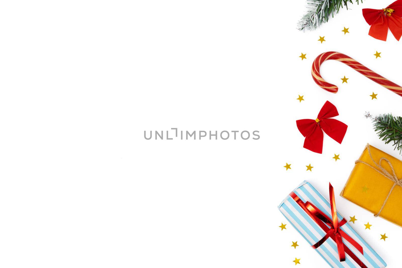 Top view of Christmas decorations composition on white background with copy space