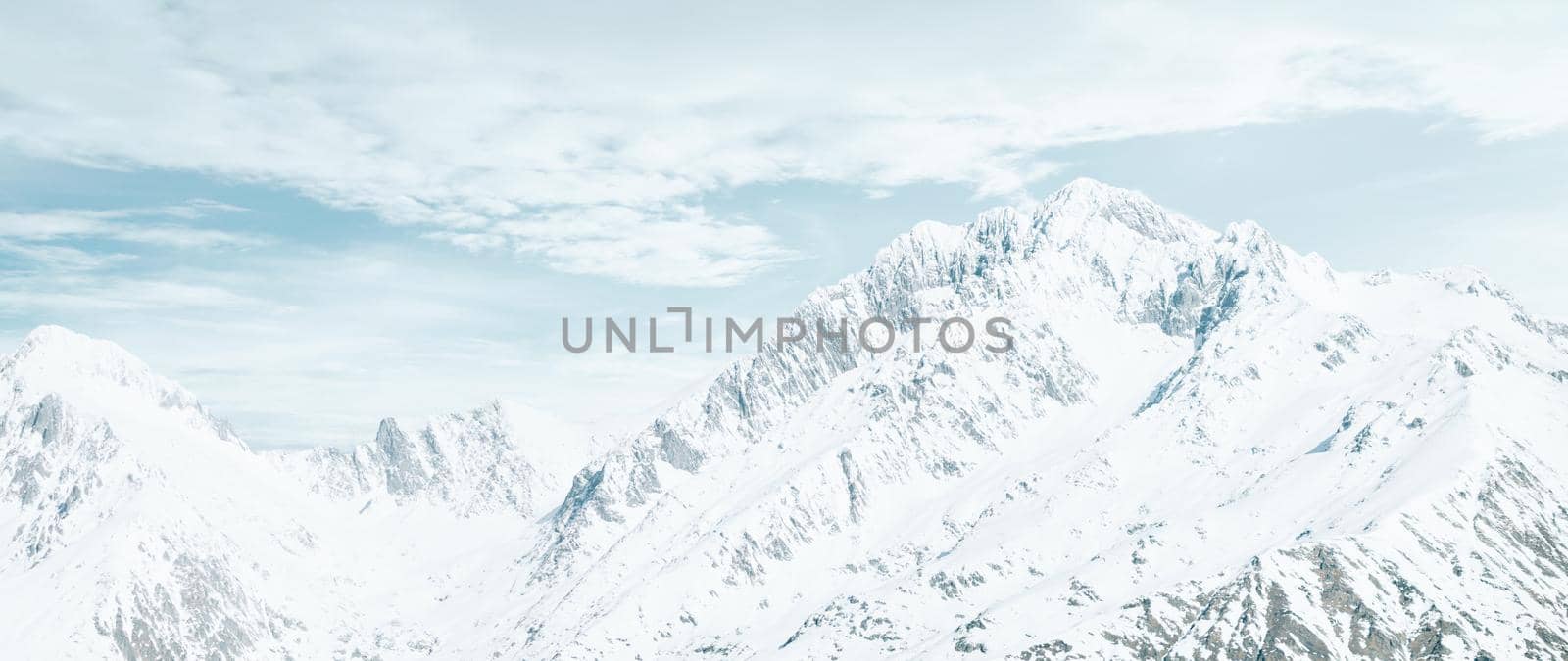 Snowy mountains peaks. by alexAleksei