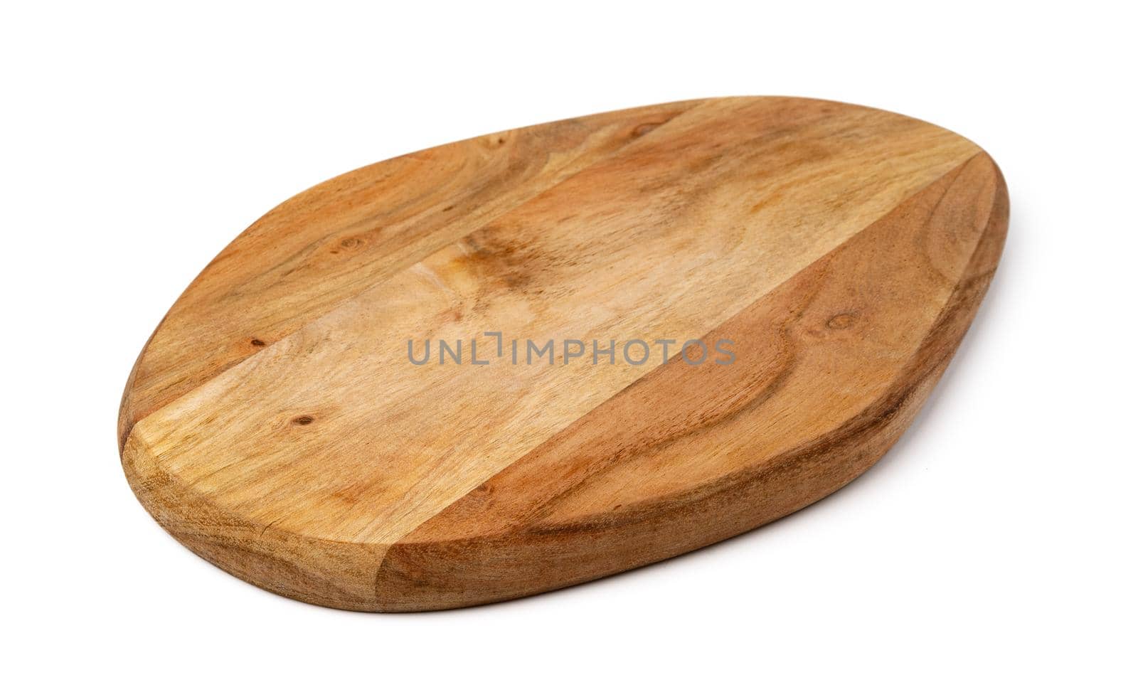 Wooden cutting board on a white background, close up