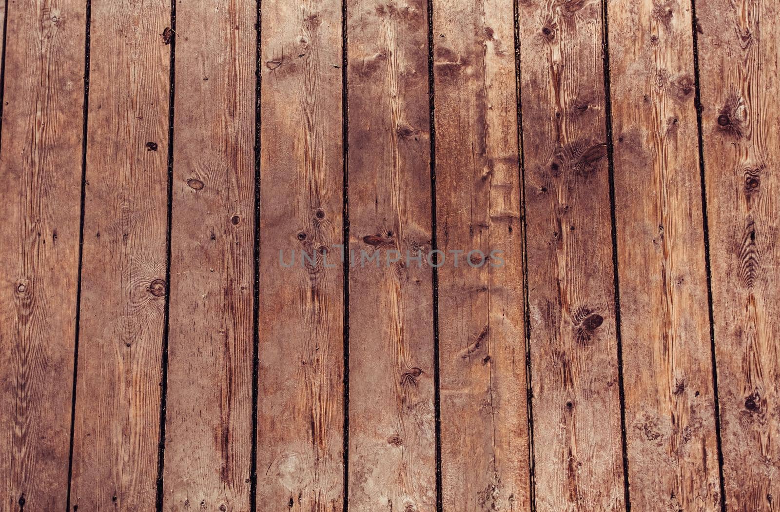 Background of vertical brown wooden planks.
